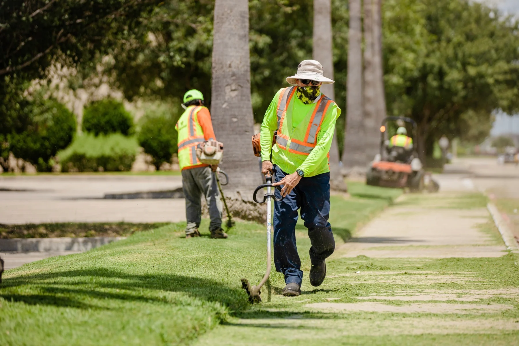 Landscaper mowing